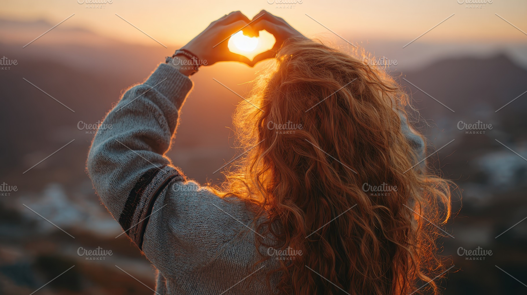 Woman framing sunset with heart hand, a Photo by Pixeness Studio