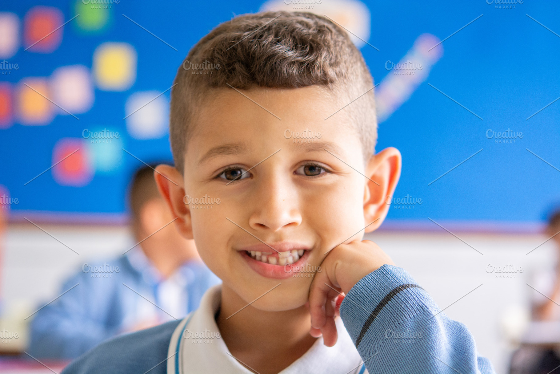 Smiling Elementary School Boy Portrait in Classroom, a School & Education Photo by etorres69