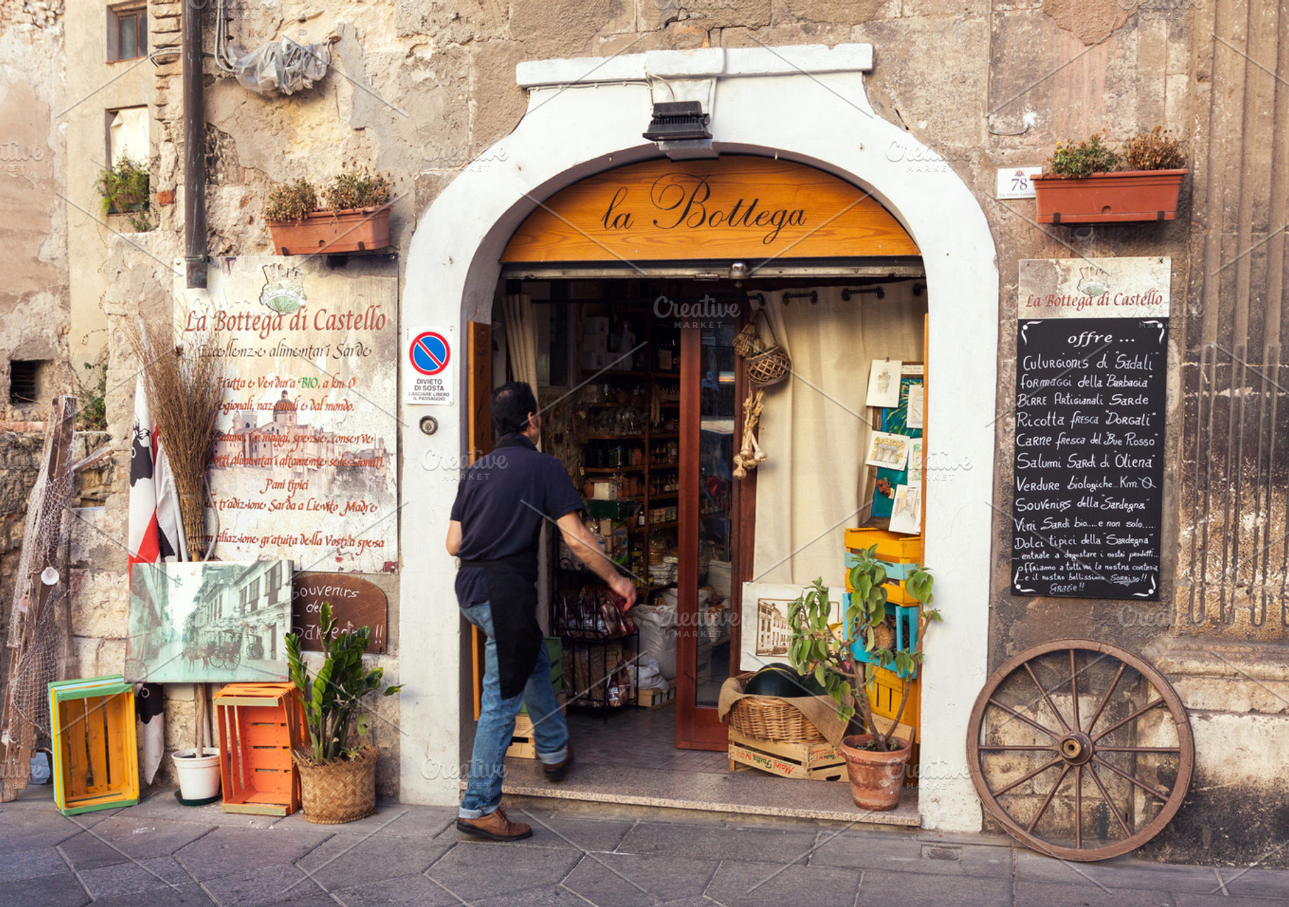 Grocery shop entrance in Italy, a Business Photo by BOOCYS