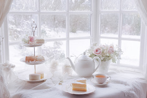Enjoying warm afternoon tea with sweet cakes by a window, watchi, a Photo by Studio ANNA
