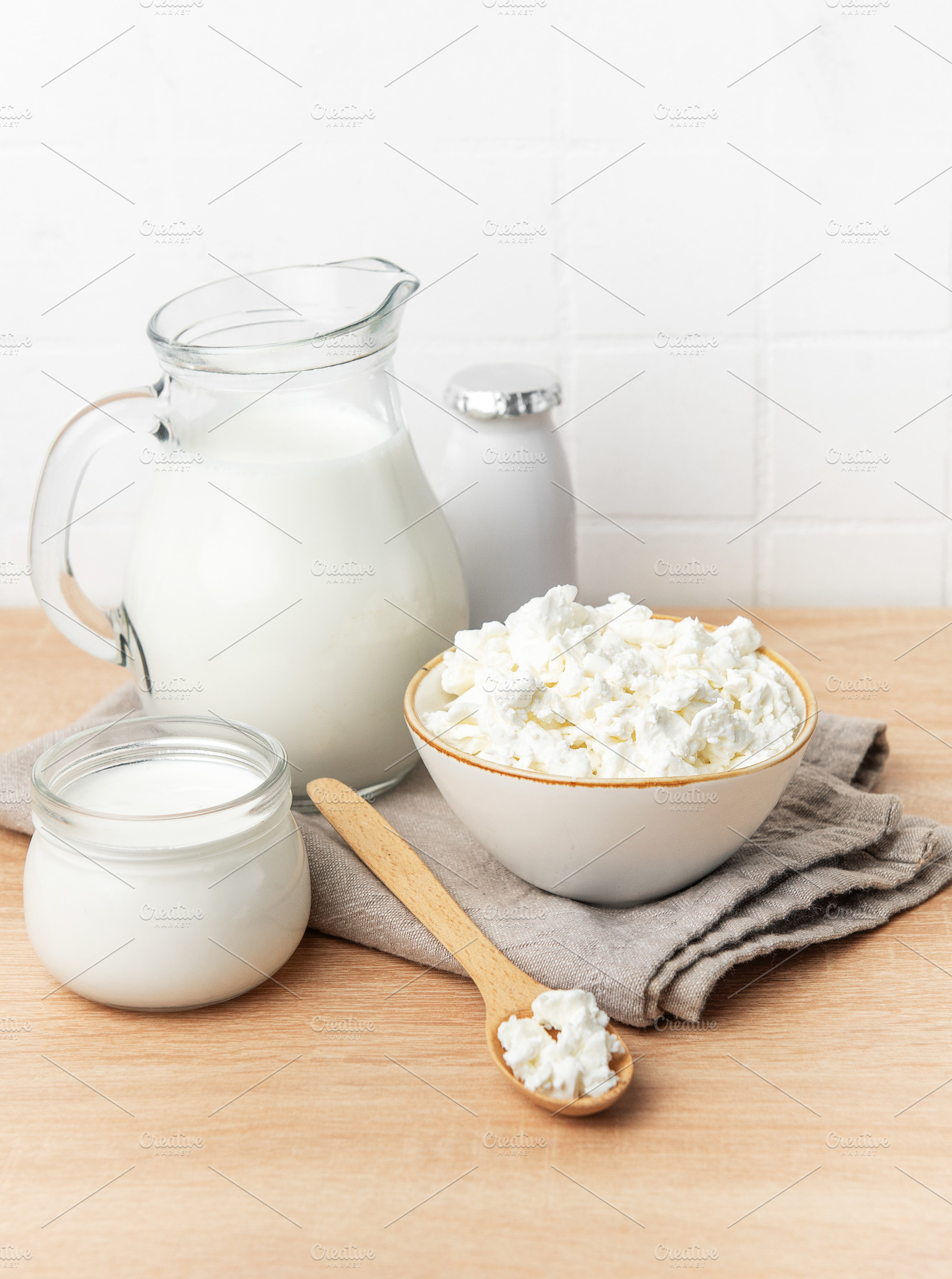 Fresh cottage cheese, milk, and yogurt creating a healthy breakf, a Food & Drink Photo by Olena Rudo