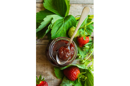 Homemade strawberry jam in a jar, a Food & Drink Photo by yanadjana