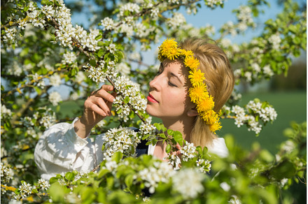 Beautiful feminime woman in national, a Holiday Photo by COLORFUL