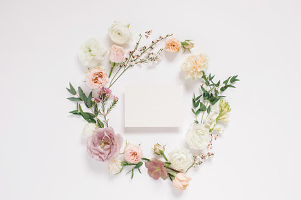 Elegant floral composition with card, an Arts & Entertainment Photo by Nina Stock Photos