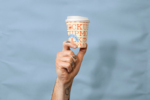 Everydays Coffee Cup in Hand Mockup