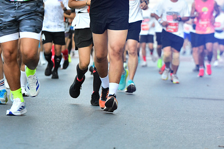 People Running On City Road.