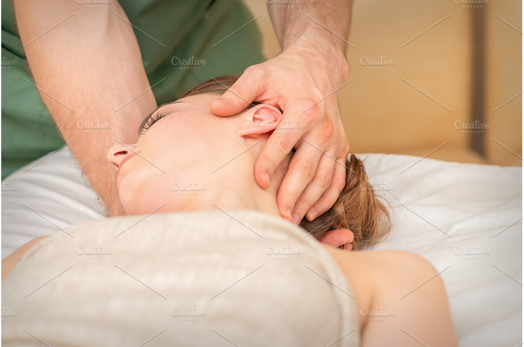 Osteopath doing massage on the, a Health & Medical Photo by okskukuruza