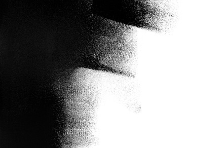 White wall partially painted in black with a paint roller containing paint, an Abstract Photo by Maksimkostenko
