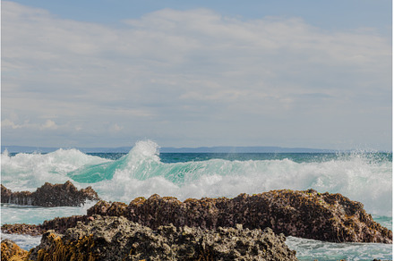 Sea wave crash at rock stone, a Nature Photo by Herlan Khenz