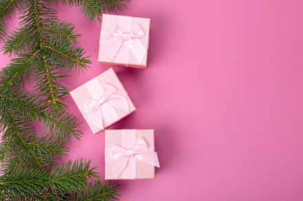Christmas gifts with pink ribbon containing space, package, and birthday, a Holiday Photo by Alim Yakubov