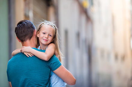 Family in europe happy father and little adorable girl in old city during, a Person Photo by travnikovstudio