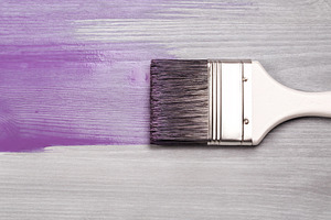 Painting gray wood purple, brush