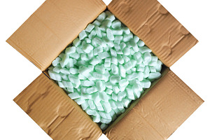cardboard box with chips isolated over white, a Photo by WorldOfPhotos