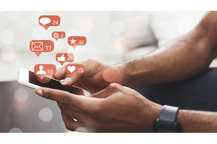 Social media. Man holding smartphone, a Technology Photo by Prostock-Studio