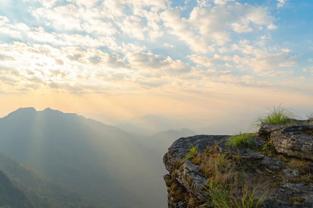Cliff in National Park, Thailand. Mountains hill view with park, a Background Photo by Tampatra