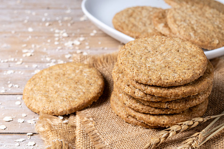 Healthy oatmeal cookies on wooden table, a Photo by etorres69