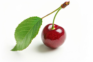 Fresh cherry with green leaf isolated on white background, a Food & Drink Photo by AlyaAnd