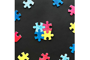 Colorful puzzle pieces arranged on a, a Photo by tilialucida