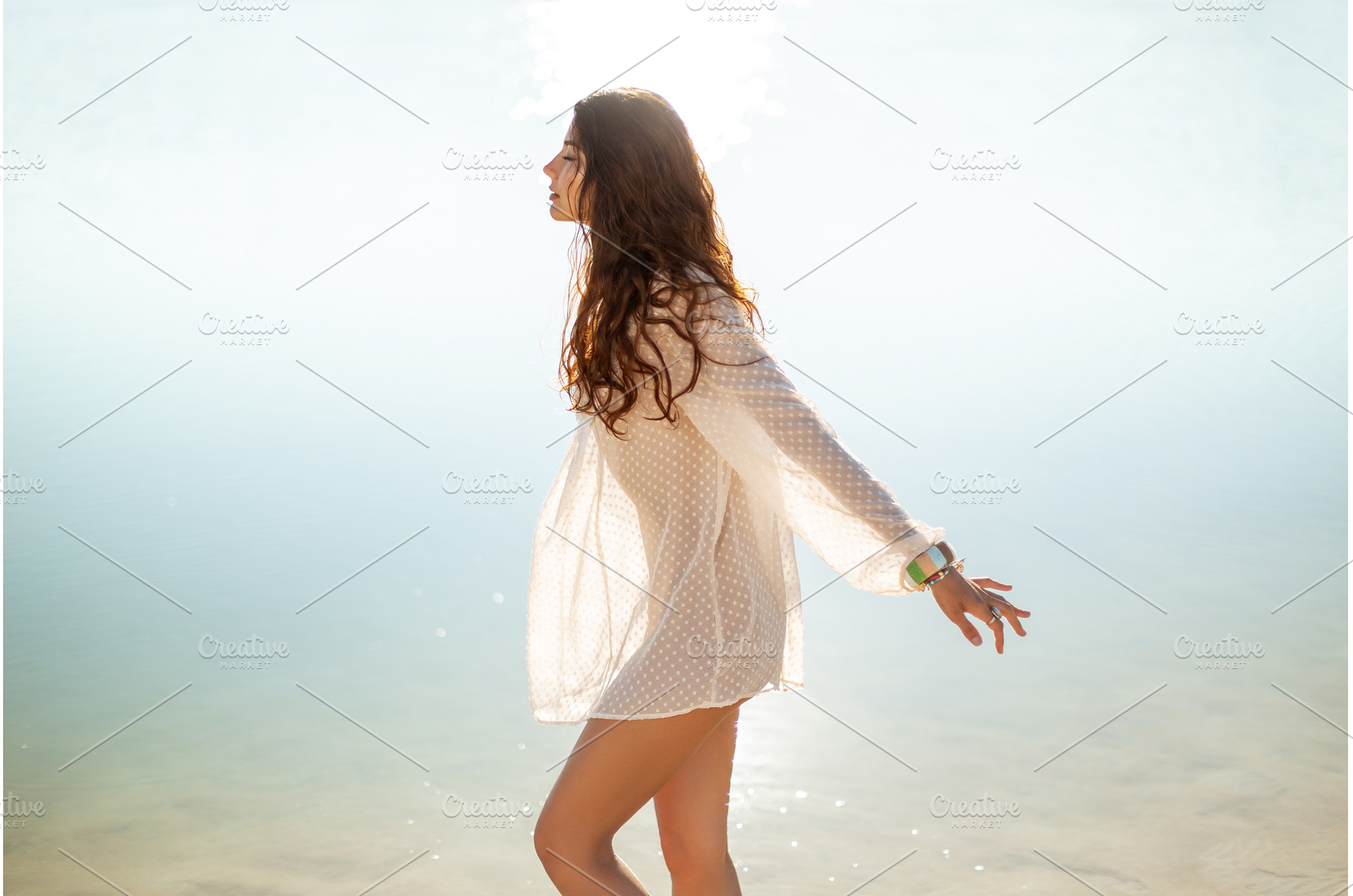 Woman Resting on the Beach During, a Holiday Photo by Emotion photo