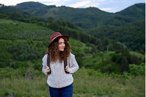 Young tourist woman traveller with, a Person Photo by HalfPoint
