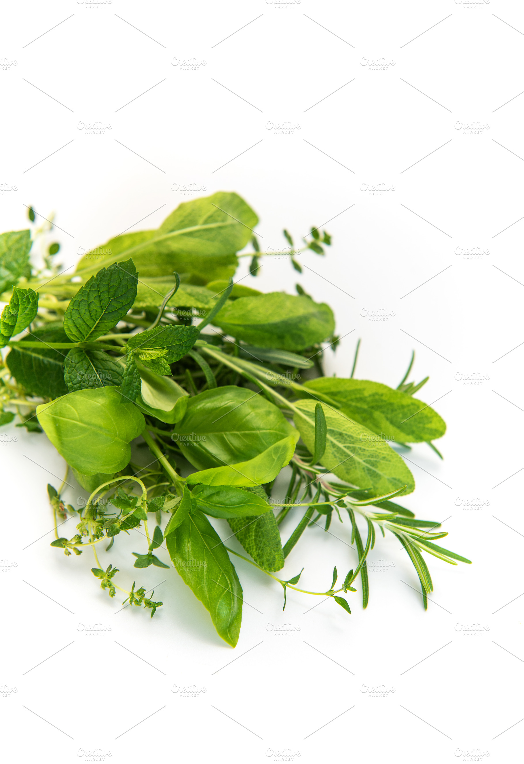 Fresh aromatic herbs mix on white background, a Food & Drink Photo by Olena Rudo