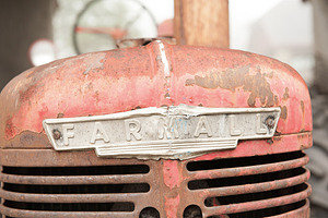 Vintage tractor featuring tractor, farmall, and red
