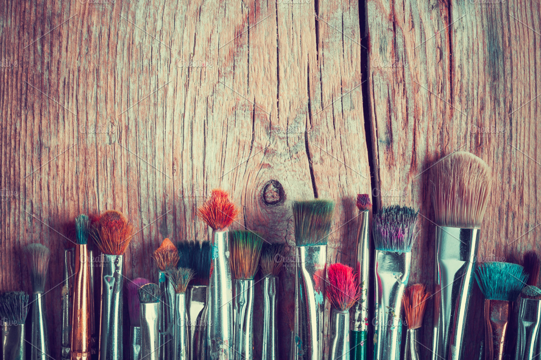 Row of artist paint brushes, an Arts & Entertainment Photo by chamillewhite