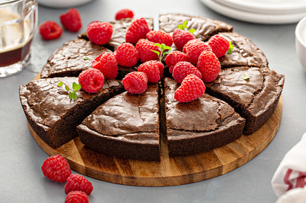 Brownie cake topped with fresh raspberries, a Food & Drink Photo by farwasser