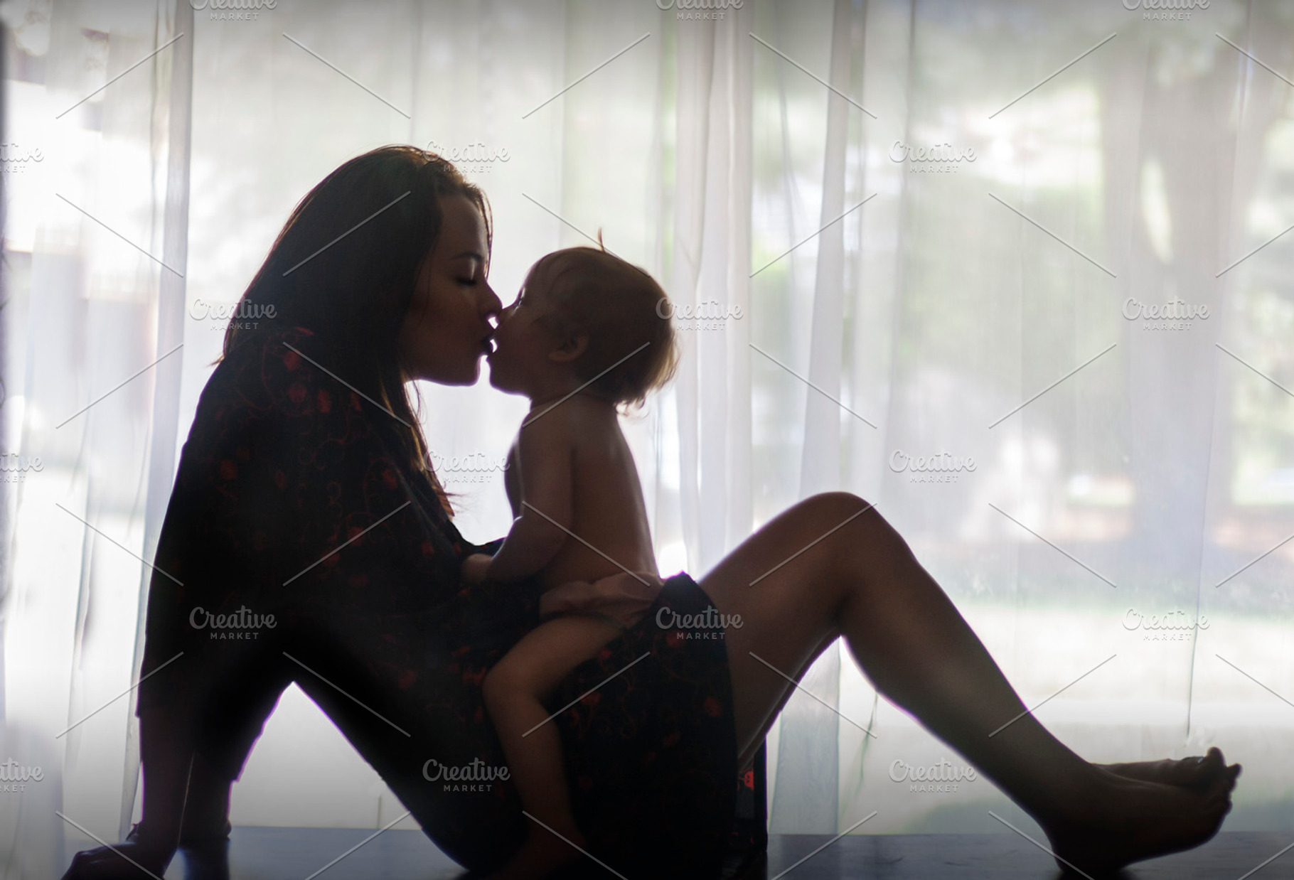 Mother child kiss, a Person Photo by Nefrith