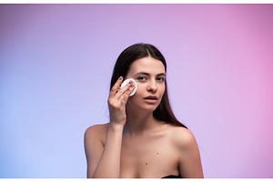 Young woman looking at the camera, a Health & Medical Photo by volodymyrshtun13795