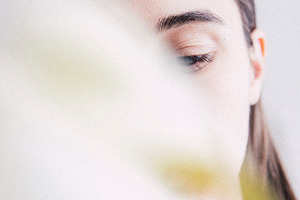 Portrait of a girl with flower stock photo containing summer and linen