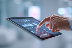 Doctor uses tablet for patient data, a Photo by Beautiful things
