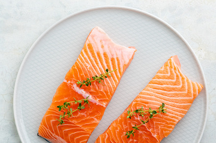 Fresh salmon fillet on a plate for delicious salmon steak.