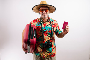 Smiling man ready for tropical vacation adventure, a Person Photo by karrastock