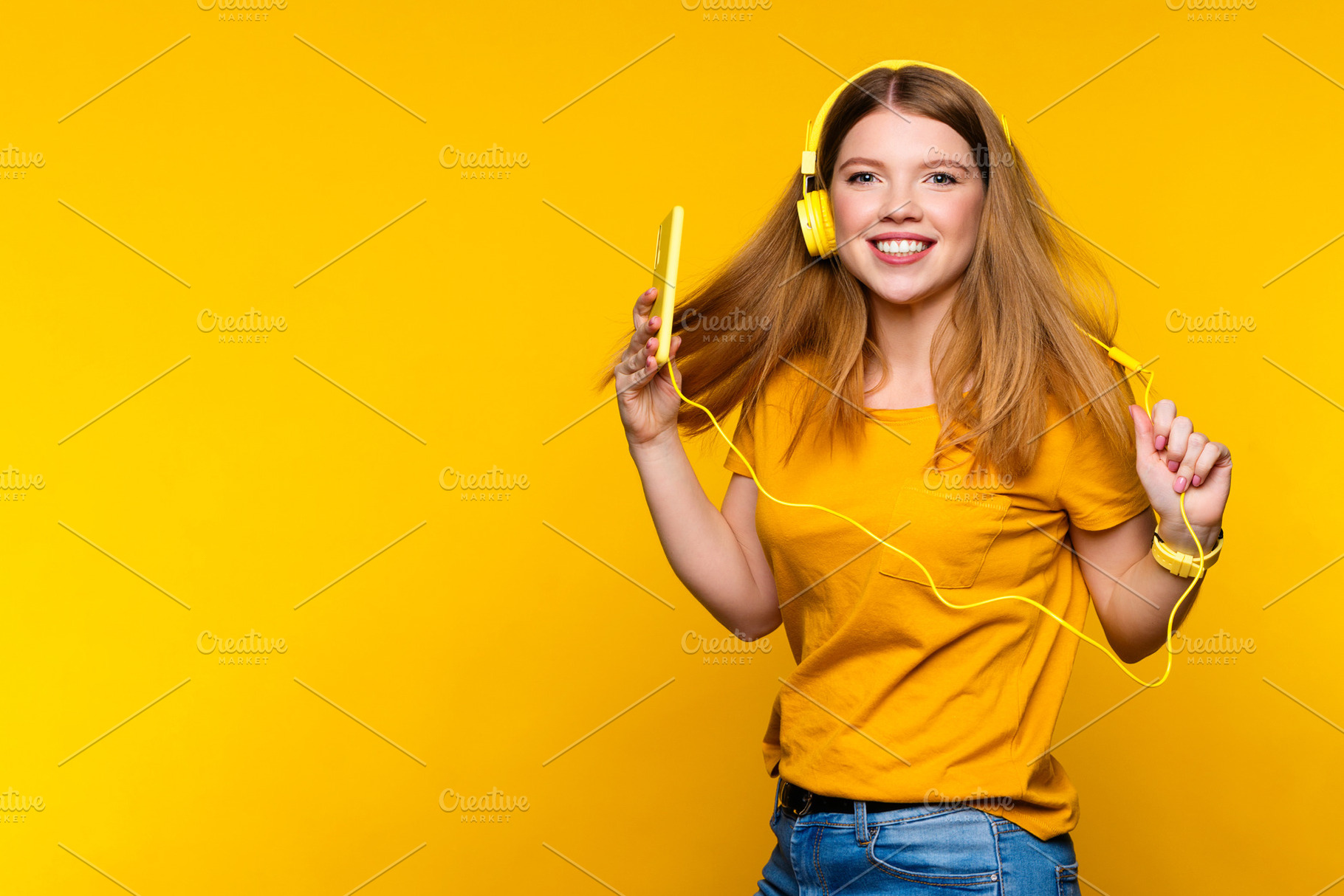 Girl in headphones with phone, a Technology Photo by Elena Vagengeim