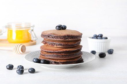 Concept of sweet food, tasty chocolate pancakes, a Food & Drink Photo by AtlasStudio PRO