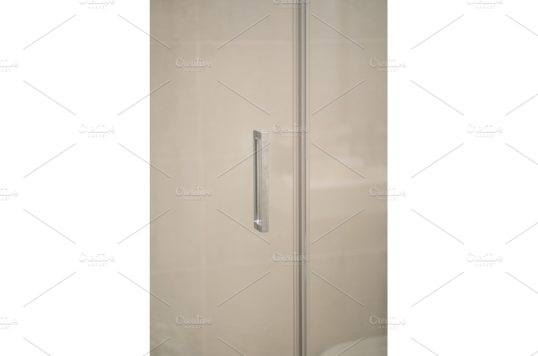 Chrome handle on a transparent glass, an Architecture Photo by volodymyrshtun13795