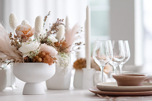 Elegant table setting featuring dried flowers centerpiece and mi, a Photo by Studio ANNA