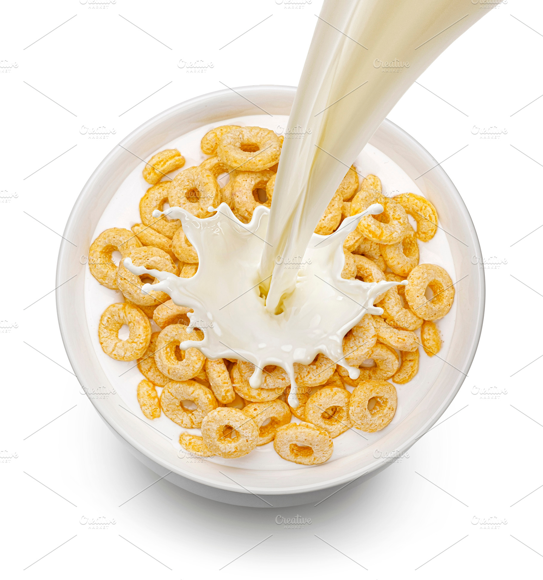 Corn rings with milk isolated, a Food & Drink Photo by Max Lashcheuski