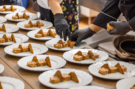 Chefs are arranging meat and toast bread pieces, a Photo by Grafvision photography
