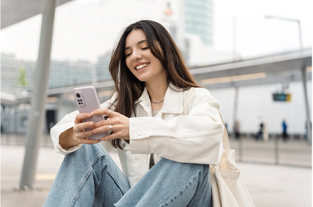 Bright and cheerful young woman with, a Person Photo by AD Stock Images