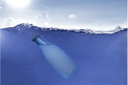 transparent glass bottle underwater