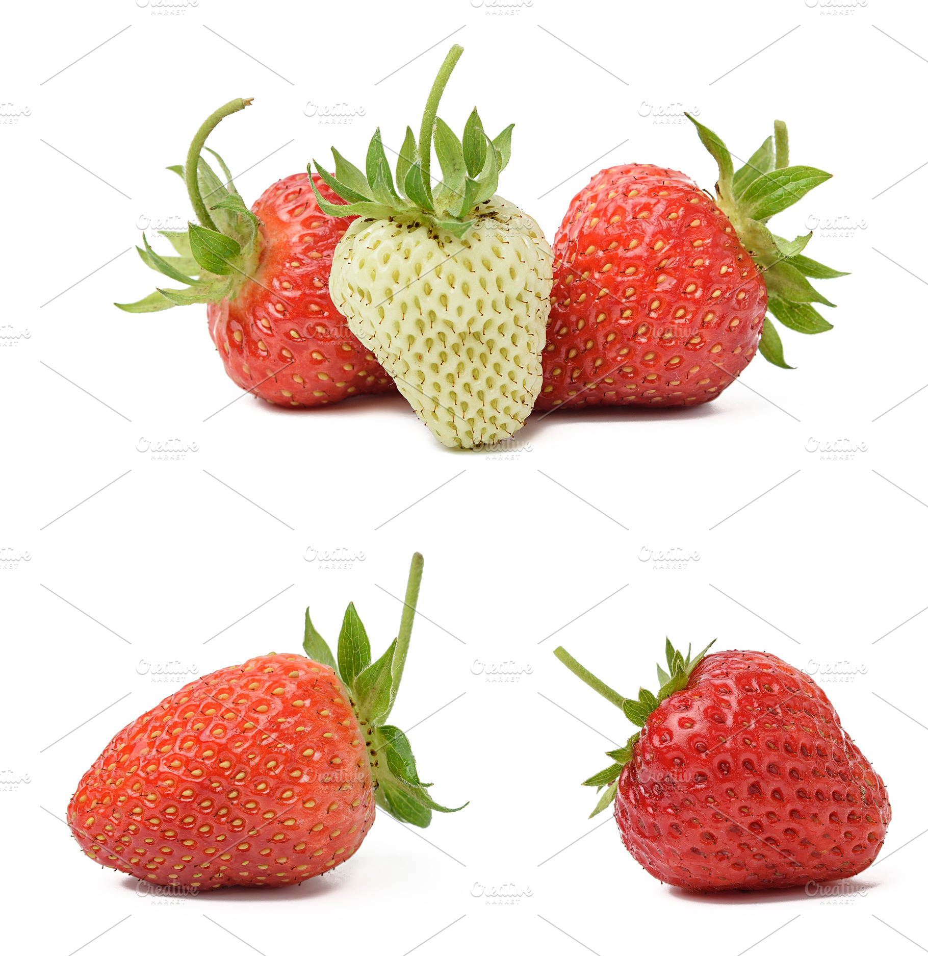 Ripe and unripe strawberries on a white isolated background, a Food & Drink Photo by ndanko