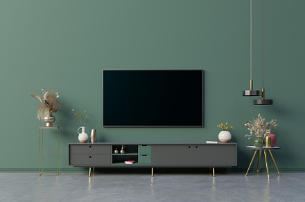 LED TV on the dark green wall in living room,minimal design.