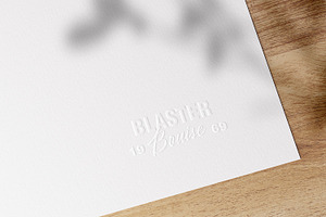 Embossed Logo Mockups On White Paper