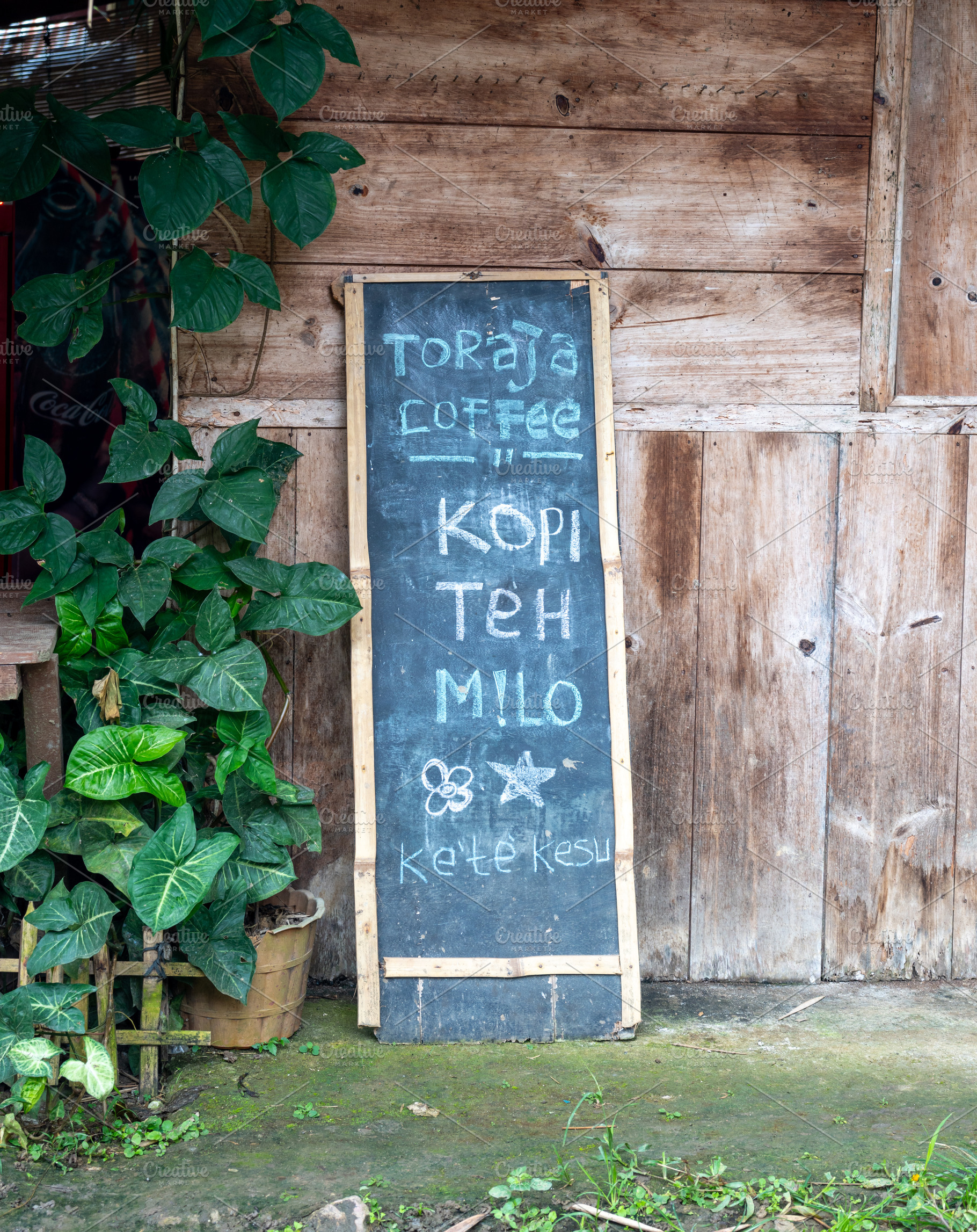 Coffee shop menu sign in Toraja village, Sulawesi, Indonesia, an Architecture Photo by GoodGoods