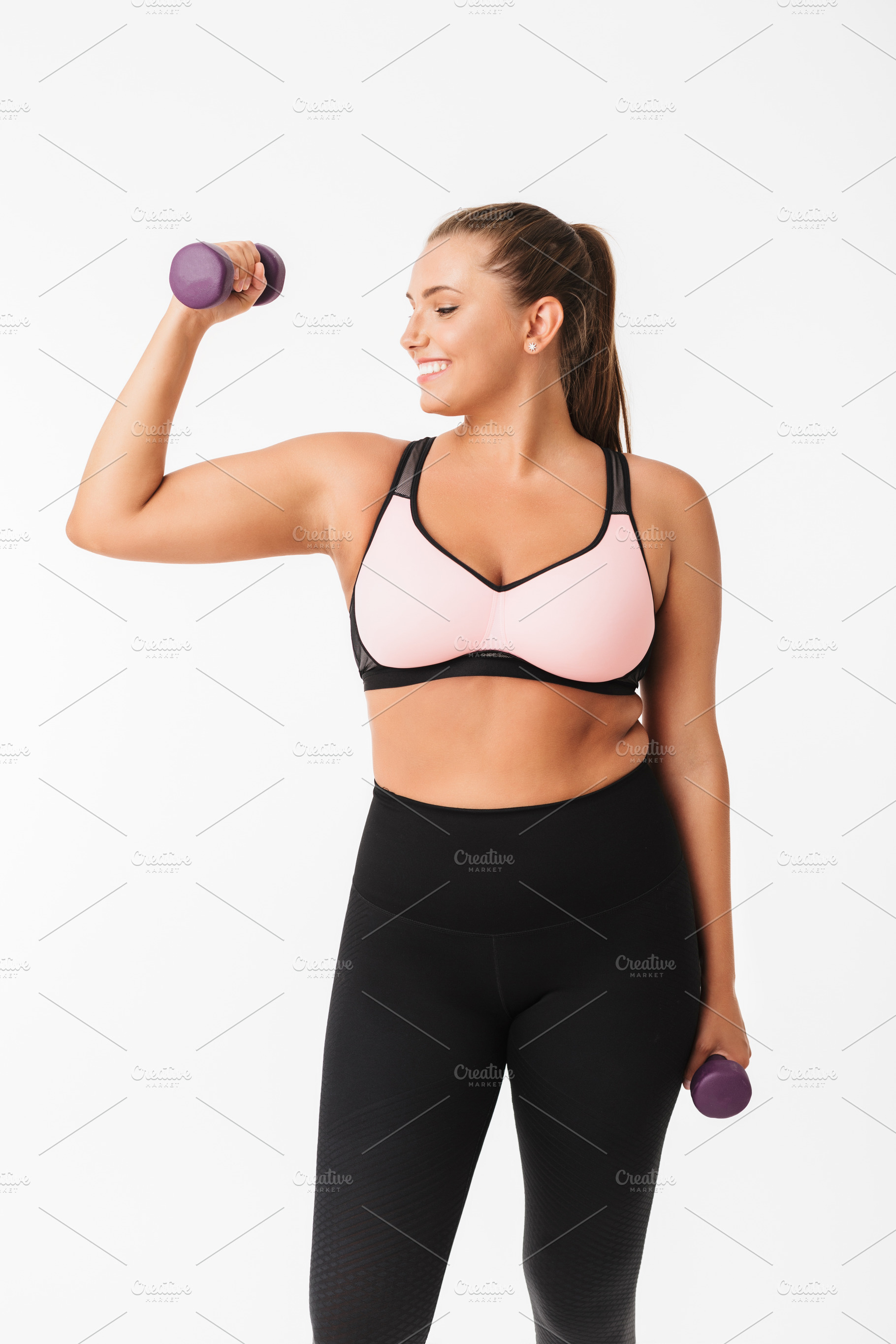 Smiling plump girl in sporty top and containing half face, positive, and, a Health & Medical Photo by Garetsworkshop