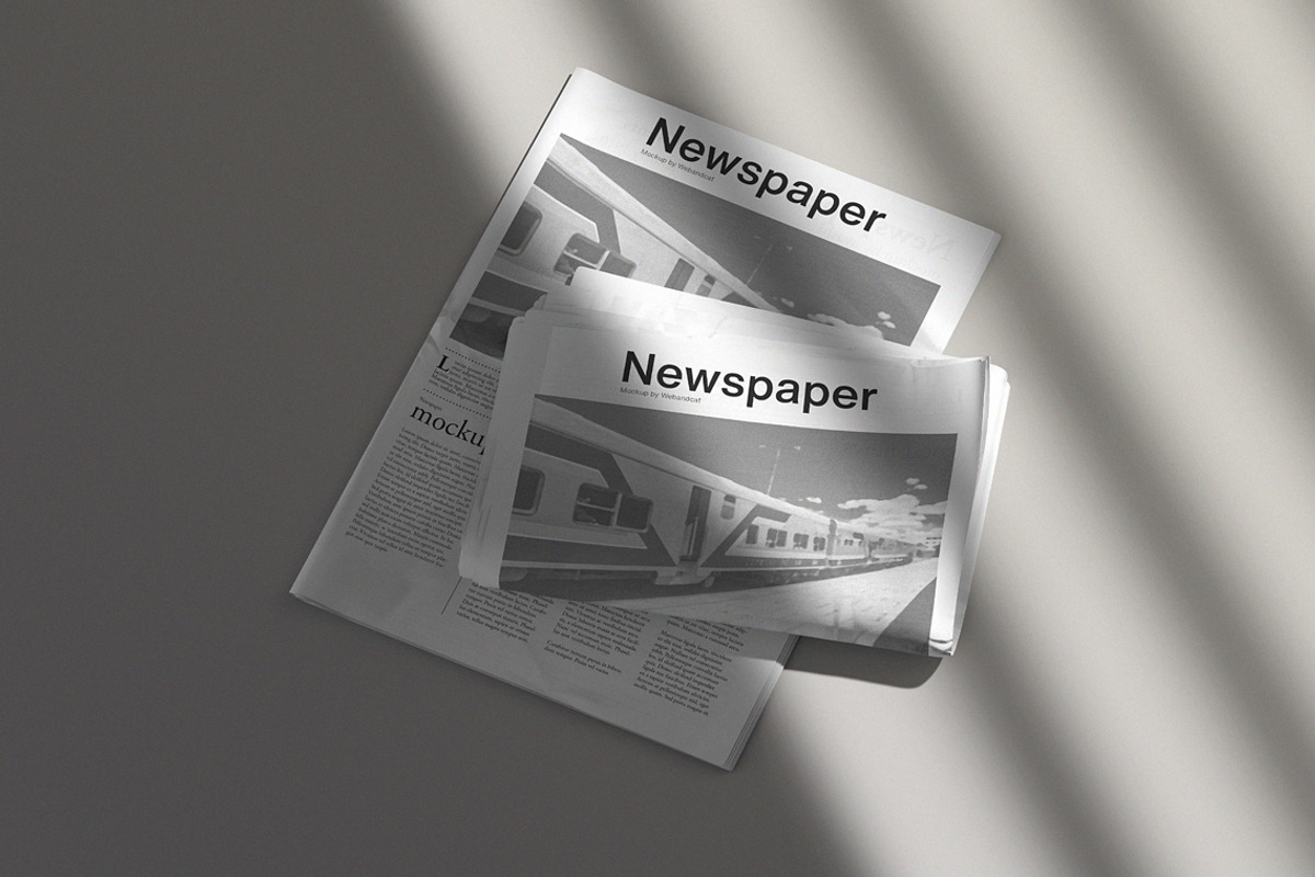 Newspaper Mockup, a Books & Magazine Mockup by WebAndCat (Photo 7 of 13)