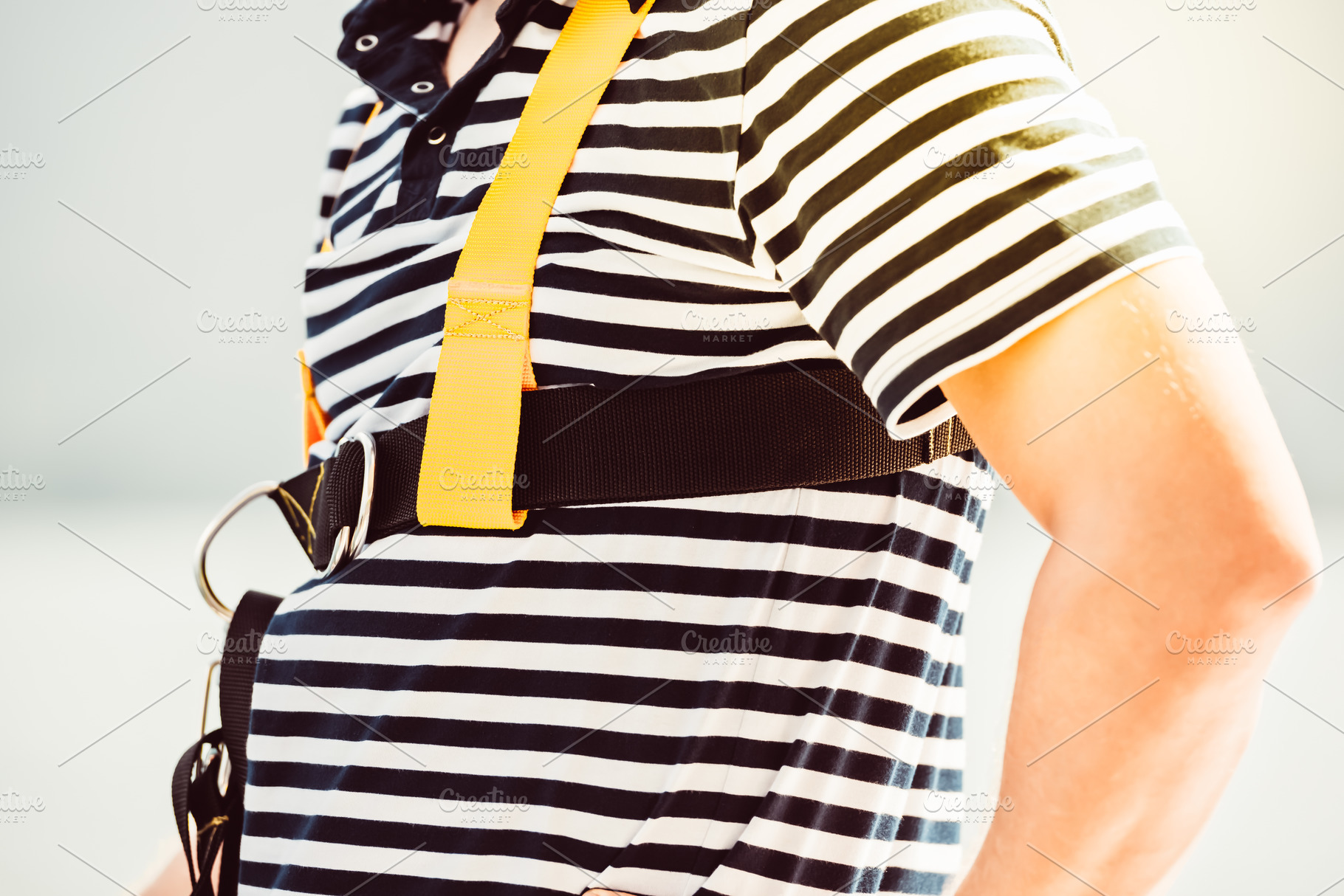 Man wearing safety harness, black, a Photo by Dvoevnore photos