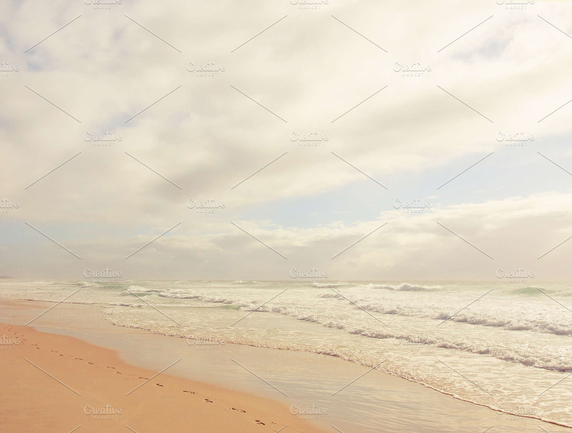 Footprints On Beach